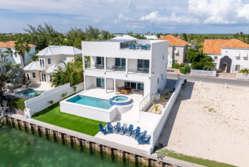 kira-isle-4br-brand-new-canal-front-home-turks-and-home-ushombi-1